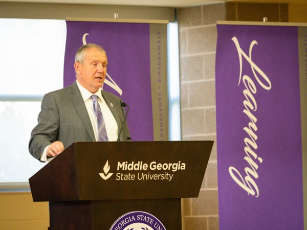 MGA President Blake speaking at MGA Honors Convocation for Spring 2022.
