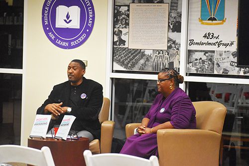 Dr. Andre Nicholson (left) and Dr. LaRonda Sanders-Senu (right) present during a reading of their book ‘Insecure, Awkward and #Winning’ at MGA’s Macon Campus.