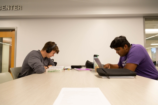 Two students studying in the Writing Center.