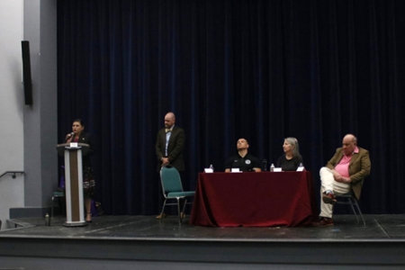 Tracie Revis (far left) speaks to the audience at the “Reclaiming the Native South” Humanities Panel hosted by Middle Georgia State University’s School of Arts and Letters on March 29, 2023 in Macon, Ga. (Photo by McKenna Kaufman, The Macon Newsroom)