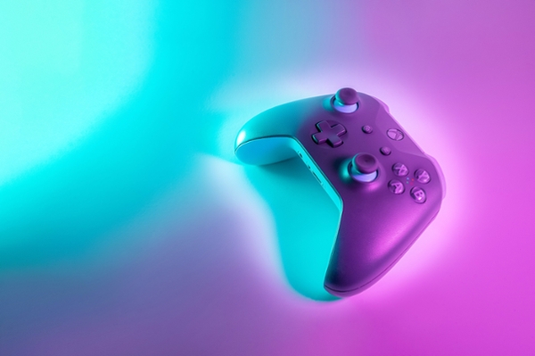 Xbox game controller light up by neon lights. 