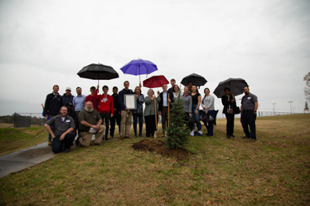 MGA representatives at a previous Arbor Day tree planting.