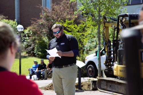 Tyler Austin, MGA grounds manager, reads the Arbor Day proclamation.