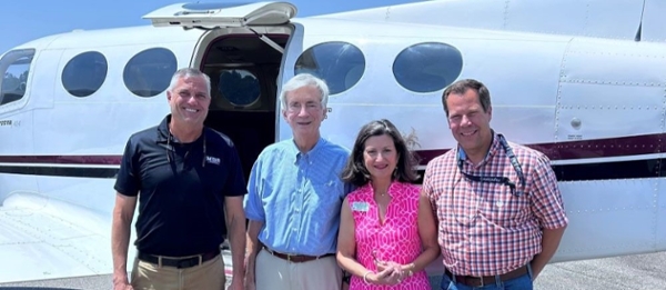 L–R: Adon Clark, dean of the School of Aviation; Marshal Mize, donor; Nancy White, vice president for Advancement; and Keith Clark, pilot.