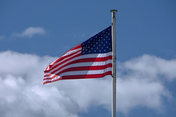 American flag flying in the wind.