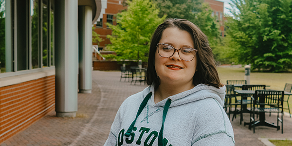 MGA student, Scarlett Grush, posing outside for a photo.