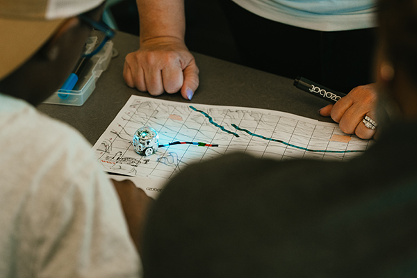Participants program robot to navigate their Martian colony using color-based coding