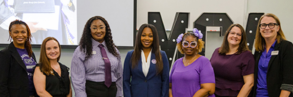 The Student Affairs Professional Development Team poses for a photo with keynote speaker, Mayor LaRhonda W. Patrick.