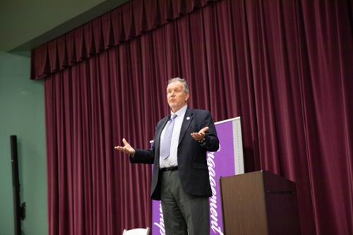 President Blake speaking at the Town Hall discussion in Macon.