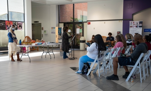 Students reading their published work at the Fall Line Review launch party. 