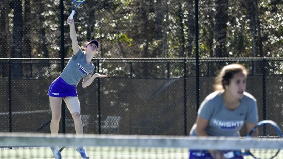 MGA's women's tennis players on the court.