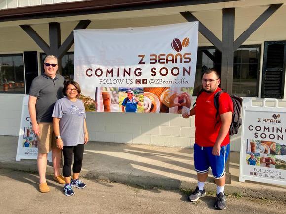 From left to right, Gus and Sally Lempsink and their son, Andrew Wilson, in front of their new coffee shop in Warner Robins across from Robins Air Force Base. The coffee shop is expected to open in mid-October. Becky Purser/The Telegraph
