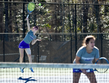 MGA Knights women's tennis players during a match.