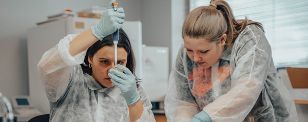 Biology students working in a lab.