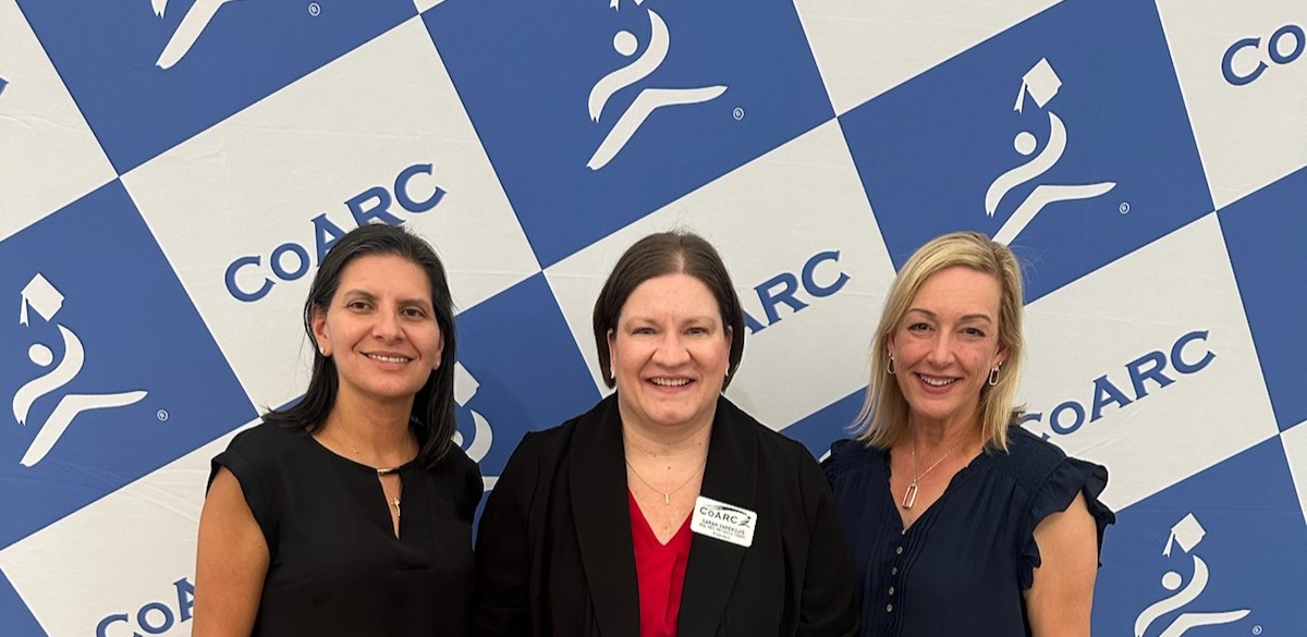 Nancy Guyse and Teri Miller holding the Distinguished Credentialing Success award at the CoARC Awards Ceremony and Reception in Snowbird, Utah.