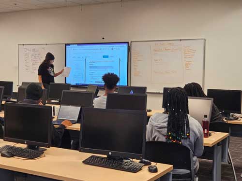 IT student gives a presentation during class.