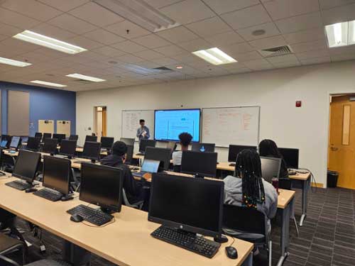 IT student gives a presentation during class.