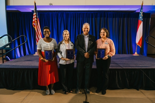 President Blake with convocation award winners.