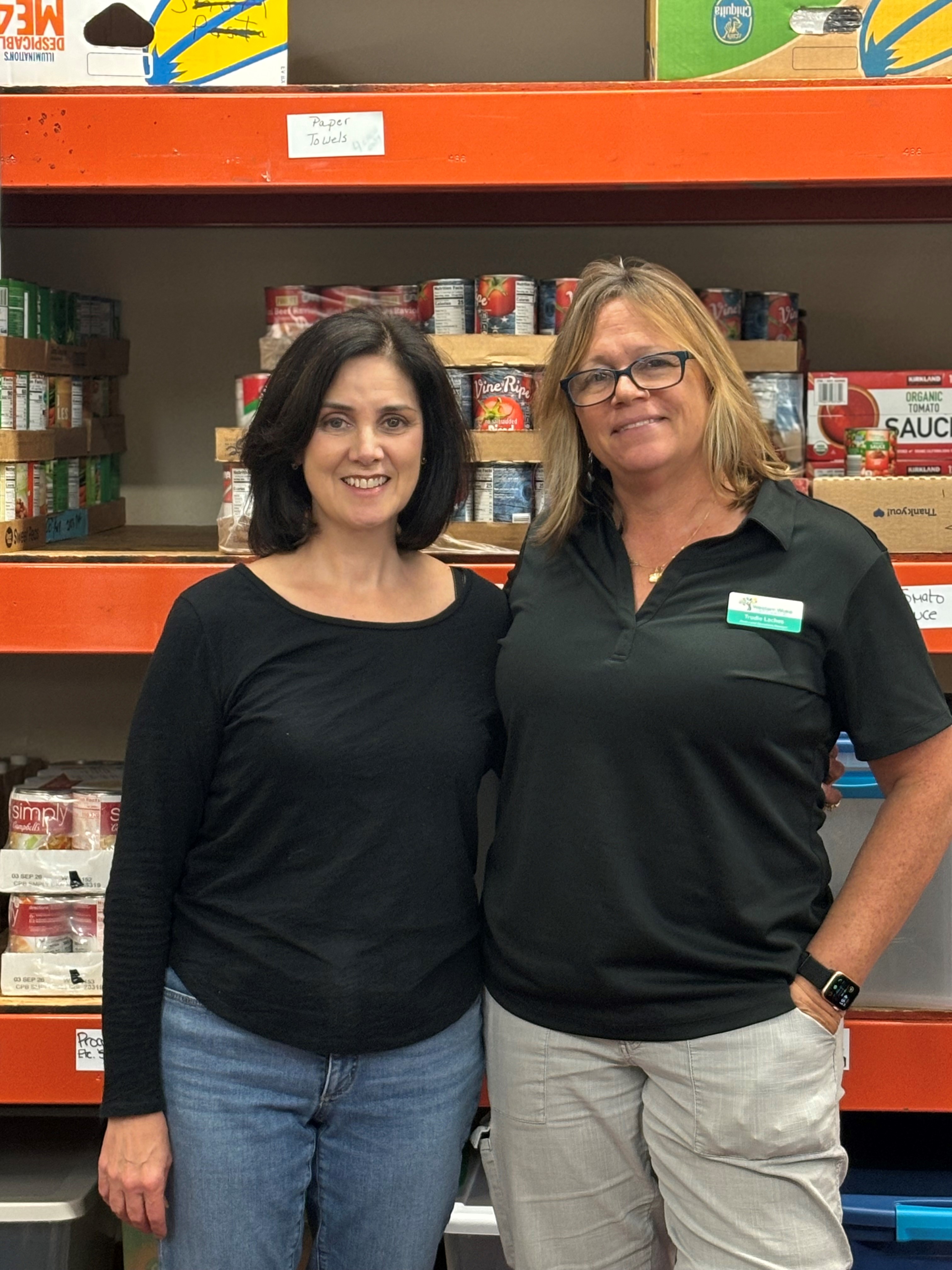 Beth Kennedy, left, with Trudie Laches, manager of the food pantry where Kennedy volunteers.