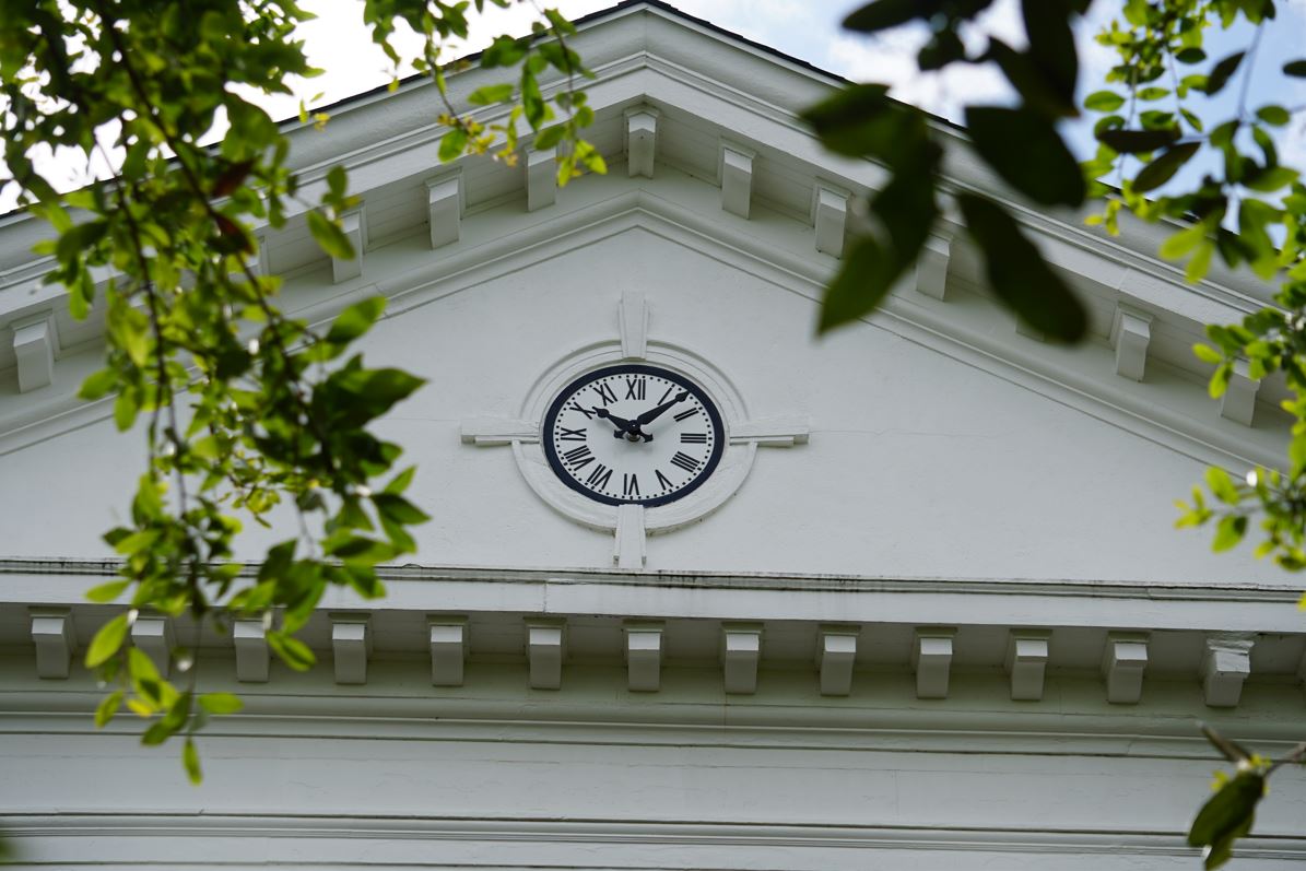 Close up photo of the clock tower on MGA's Cochran Campus.