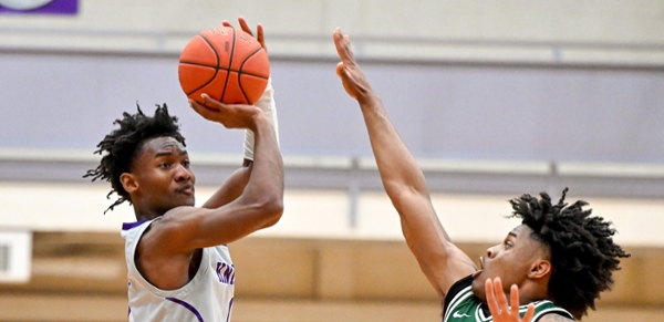 Knights men's basketball player dribbling the ball during a game.