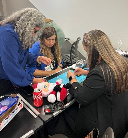 Dr. Emily Riggs, assistant professor in the MSOT program, along with a staff member from Lekotek of Georgia and Dr. Amy Shaffer from the Technical College System of Georgia, present a session, “Adapted Toys: An Avenue to Participation.”