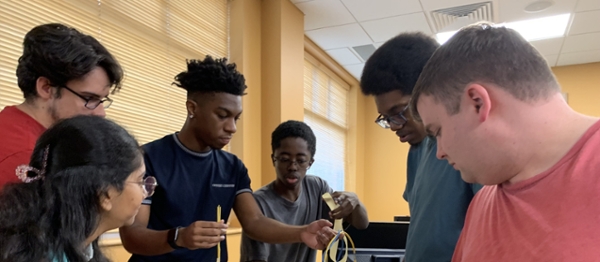 MGA IT students compete in the Marshmallow Challenge.