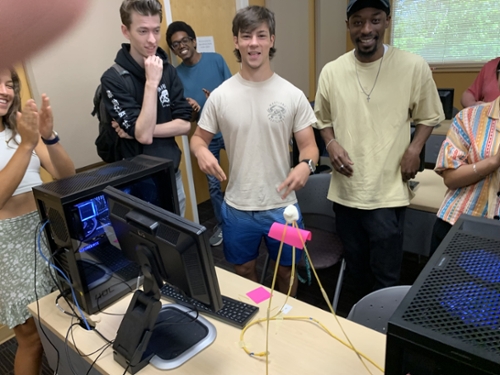 MGA IT students compete in the Marshmallow Challenge.