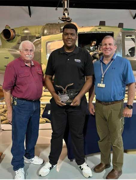 Adon Jerald is honored with the “Volunteer of the Year” award at the Museum of Aviation in Warner Robins.