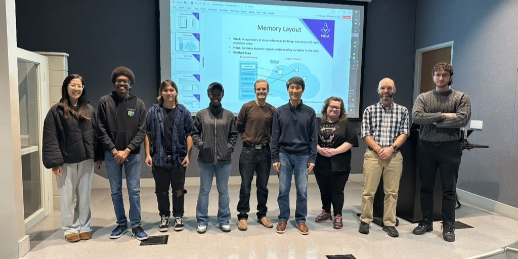 Dr. Myungjae Kwak with students at the Programming Bootcamp in Warner Robins.