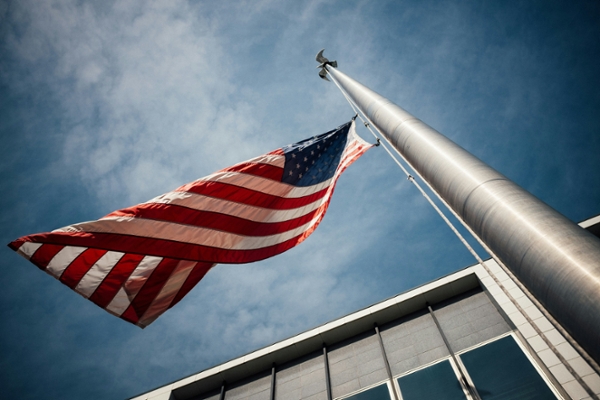 American flag flying in the wind. 