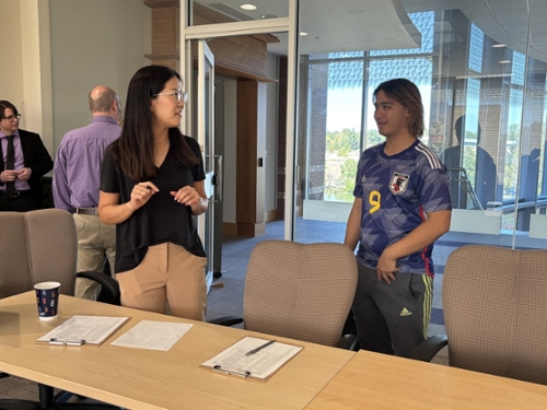 MGA faculty meet with IT and computer science students.