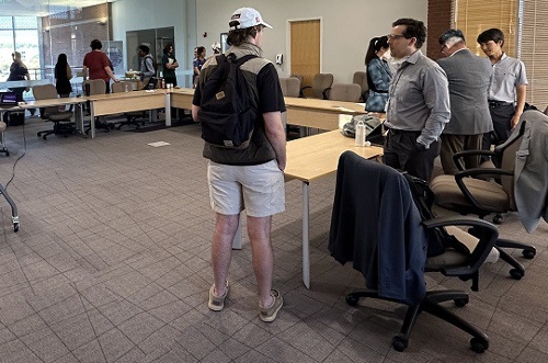 MGA faculty meet with IT and computer science students.