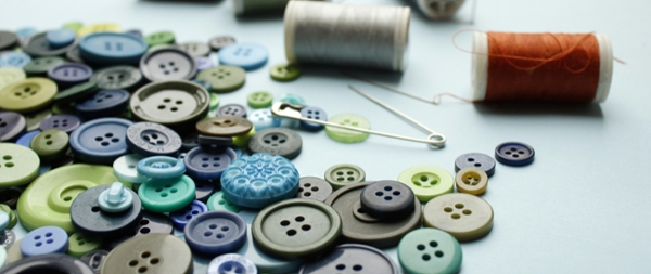 Buttons and sewing needles. 