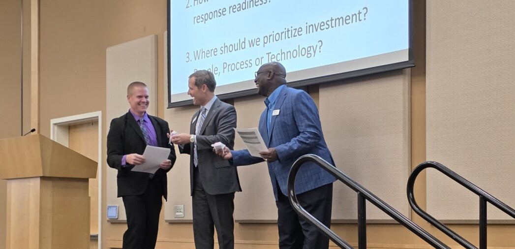 Students, faculty, and professionals present at MGA's 8th Annual Cybersecurity Seminar.