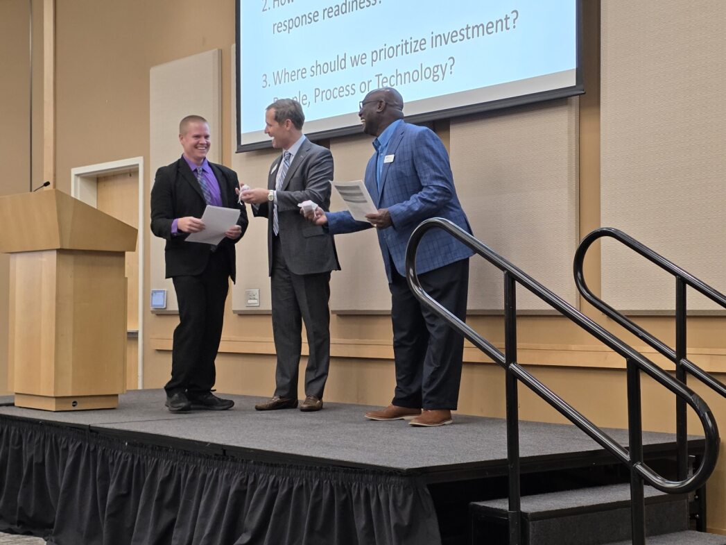 Students, faculty, and professionals present at MGA's 8th Annual Cybersecurity Seminar.