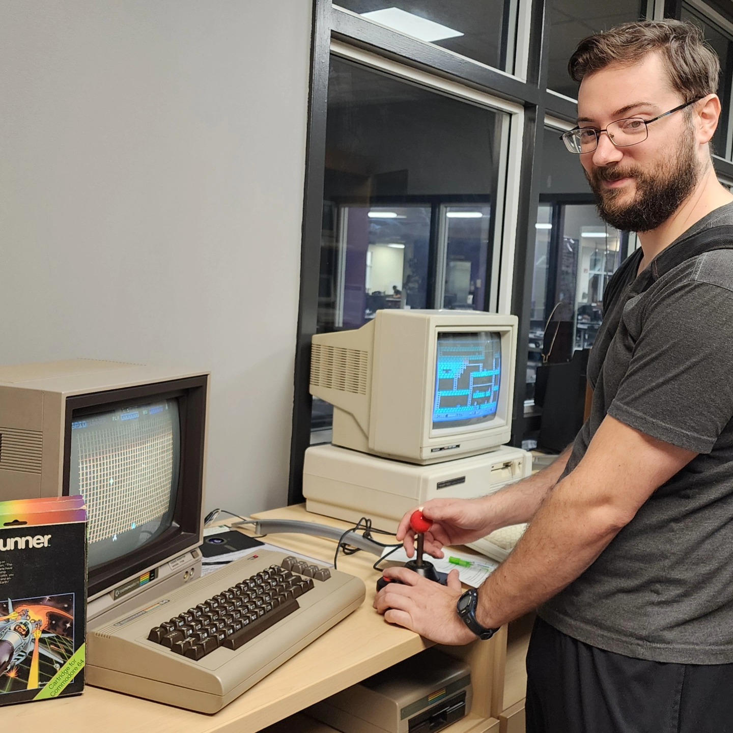 Student plays on a vintage game console in the MoT.