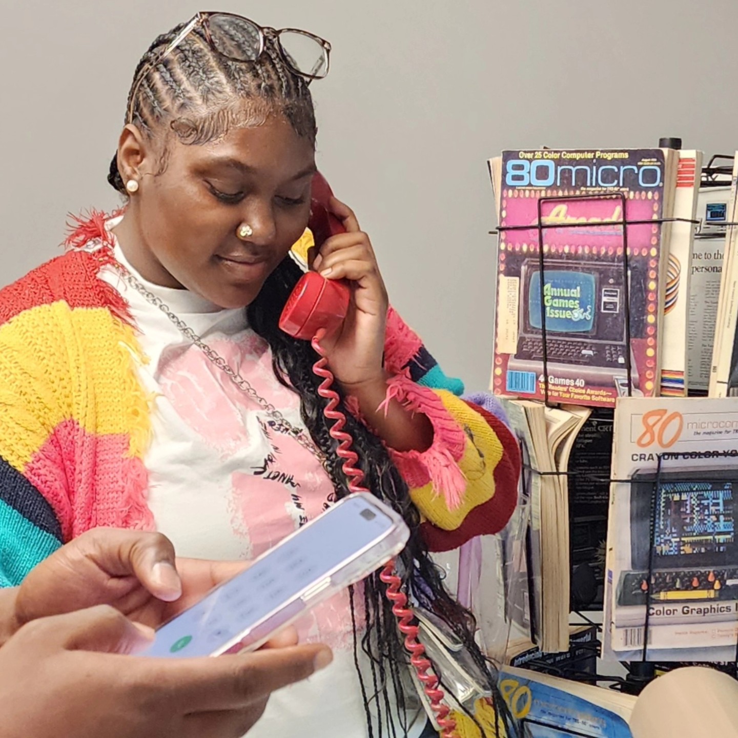 Student uses a vintage phone in the MoT.