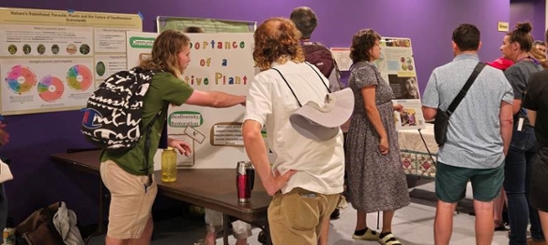 Cullowhee Native Plant Conference poster presentation session, where Grieshop presented the results of a survey related to the importance of native plants to conference-goers.