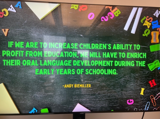 Monitor that reads, "If we are to increase children's ability to profit from education, we will have to enrich their oral language development during the early years of schooling." 