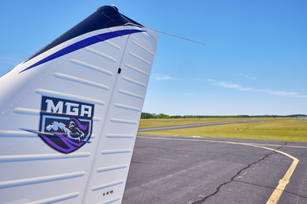 Plane wing featuring the MGA logo. 