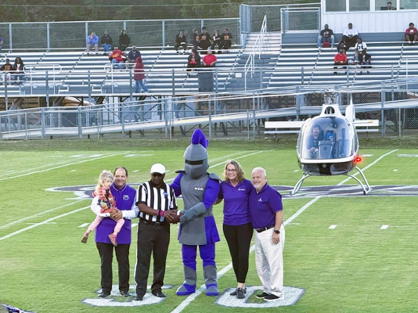 Representing MGA to accept the game sponsorship plaque were Dr. Jennifer Brannon, Michael Brown, Randy Thompson, and everyone’s favorite Knight, Duke.