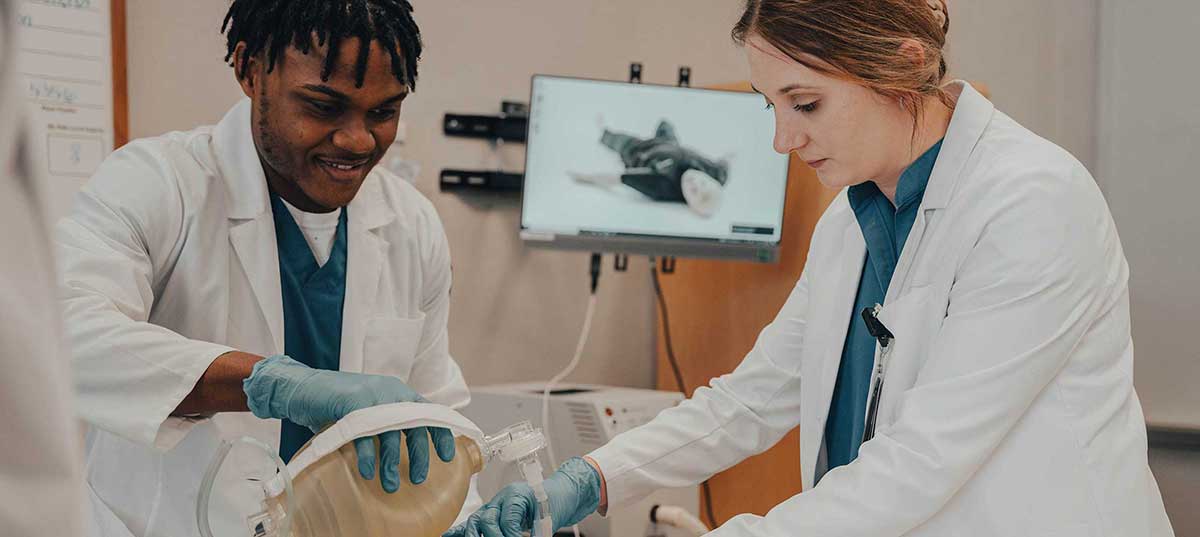 MGA respiratory therapy students practice patient care during lab. 