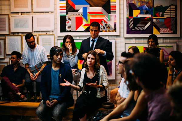 Group of people meeting in a room. 