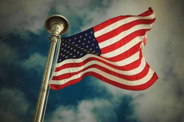 American flag flying in the wind. 