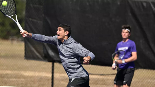 Men's tennis players competing on the court.