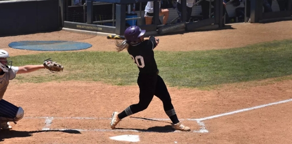 Knights softball player up to bat at NAIA tournament.