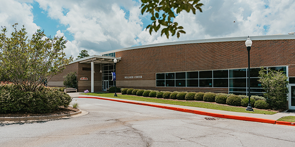 Wide image of the front of the Cochran Campus Wellness Center building.