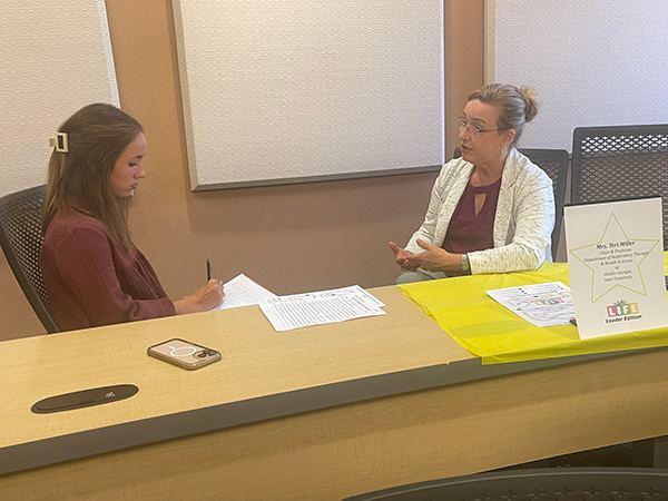 Health Sciences Leadership student interviewing faculty members.