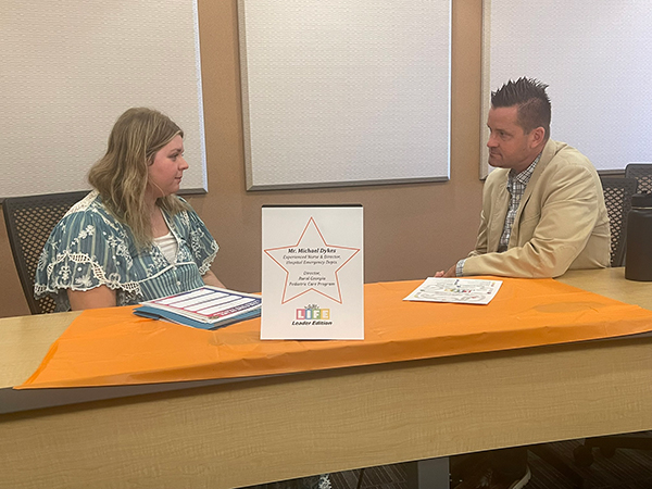 Health Sciences Leadership student interviewing faculty members.